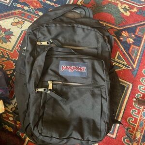 JanSport Black Backpack with Red Logo